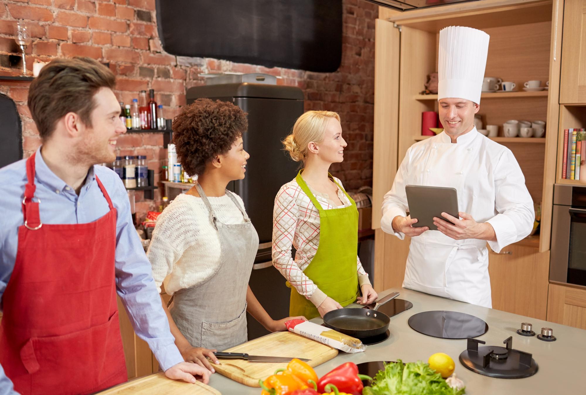 Workshop kitchen with chef inviting